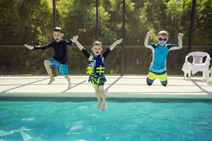 Pool Enclosures Keep Fun in and Elements Out